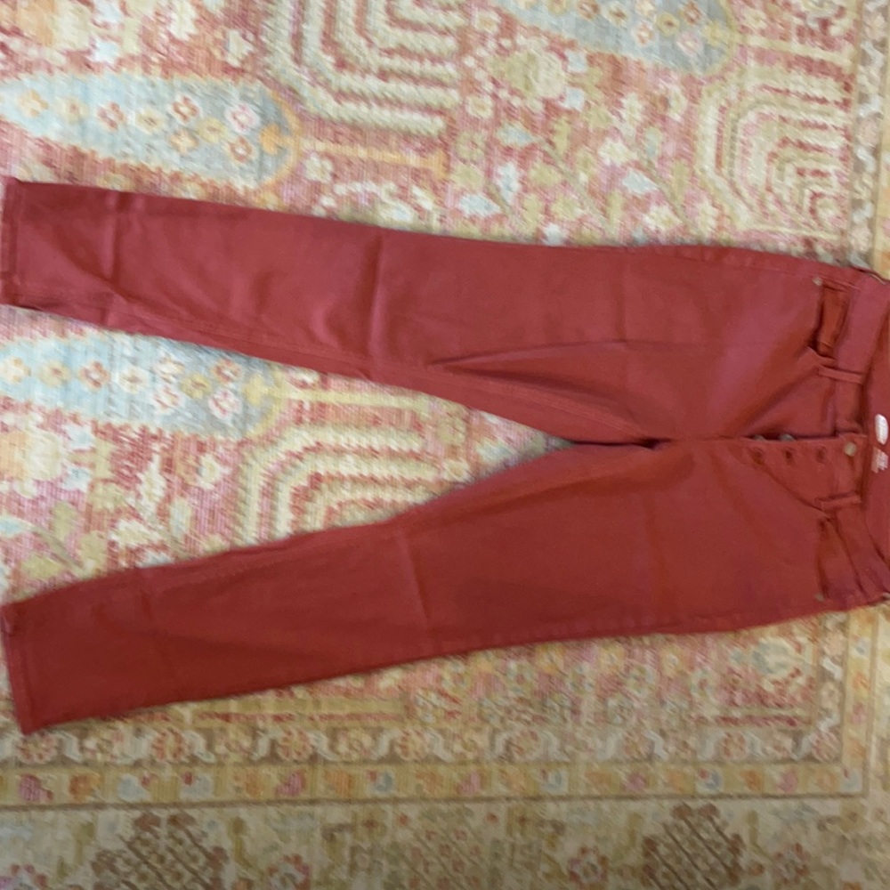 Rust color high rise button fly denim